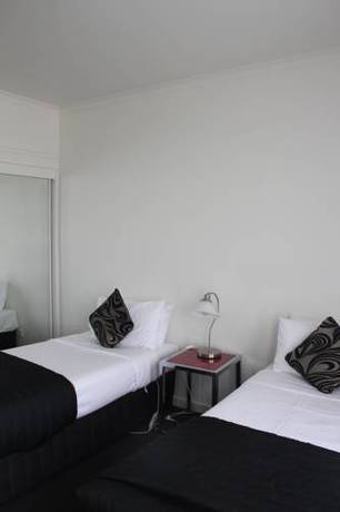Imagen de la habitación del Hotel Clocktower Apartment. Foto 2