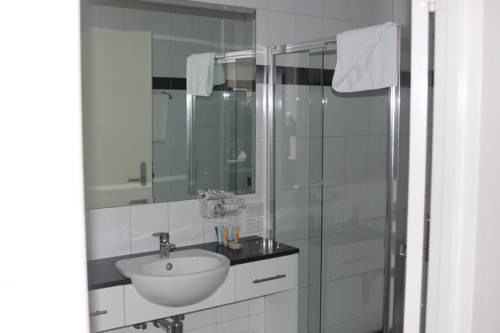 Imagen de la habitación del Hotel Clocktower Apartment. Foto 3