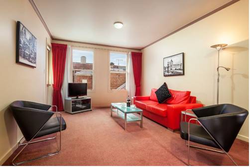 Imagen de la habitación del Hotel Clocktower Apartment. Foto 4