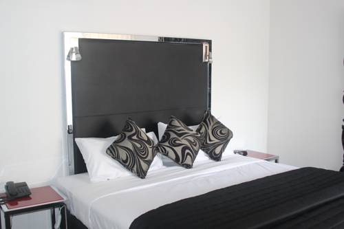 Imagen de la habitación del Hotel Clocktower Apartment. Foto 5