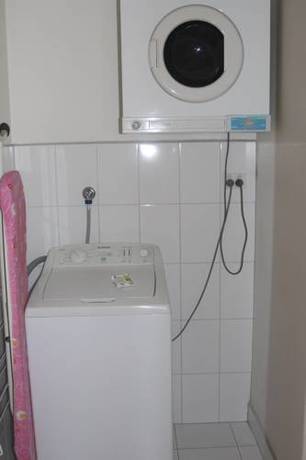 Imagen de la habitación del Hotel Clocktower Apartment. Foto 6