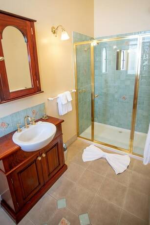 Imagen de la habitación del Hotel Clocktower Suites. Foto 21