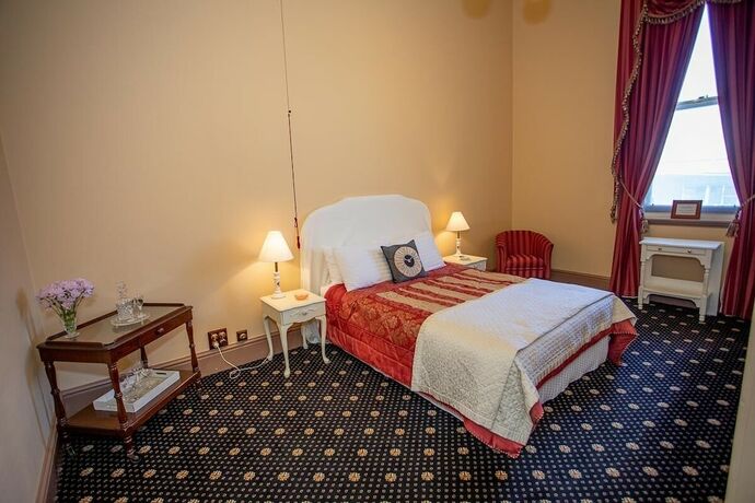 Imagen de la habitación del Hotel Clocktower Suites. Foto 27