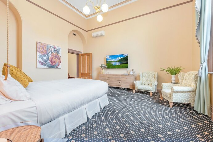 Imagen de la habitación del Hotel Clocktower Suites. Foto 31