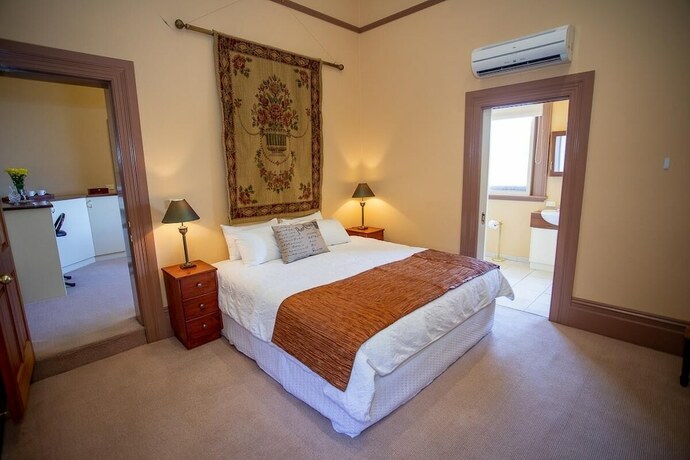 Imagen de la habitación del Hotel Clocktower Suites. Foto 34