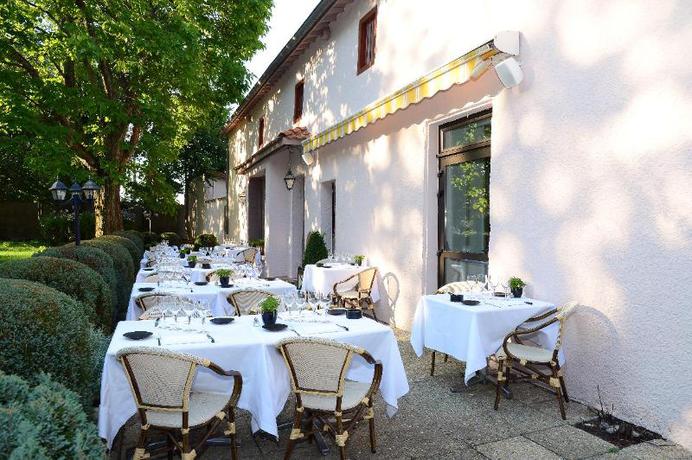 Imagen del bar/restaurante del Hotel Clos St Eloi, The Originals Relais (relais Du Silence). Foto 2