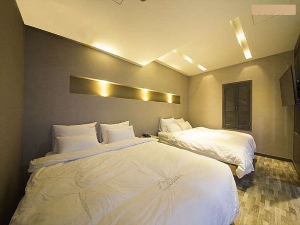 Imagen de la habitación del Hotel Cloud 9 Hotel. Foto 4