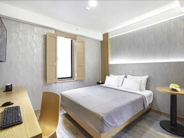 Imagen de la habitación del Hotel Cloud 9 Hotel. Foto 9