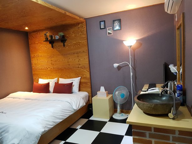 Imagen de la habitación del Hotel Cloud 9 Hotel. Foto 11