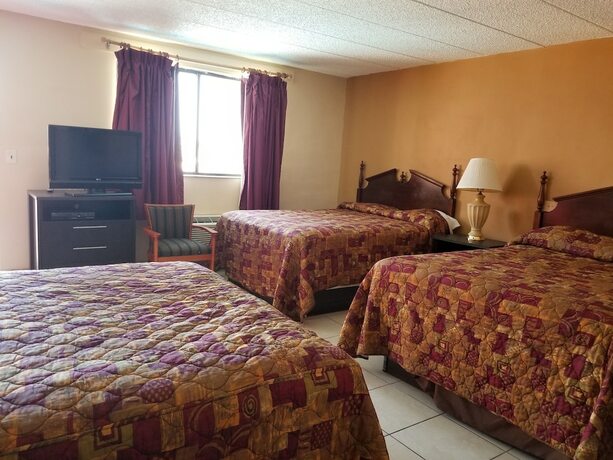 Imagen de la habitación del Hotel Cloud 9 Inn. Foto 19