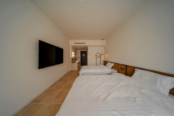 Imagen de la habitación del Hotel Cloud 9, Luoyang. Foto 5