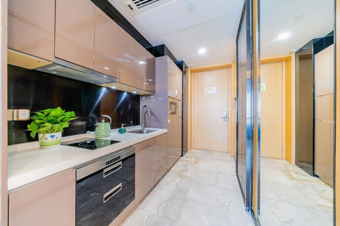 Imagen de la habitación del Hotel Cloudy International Apartment. Foto 11