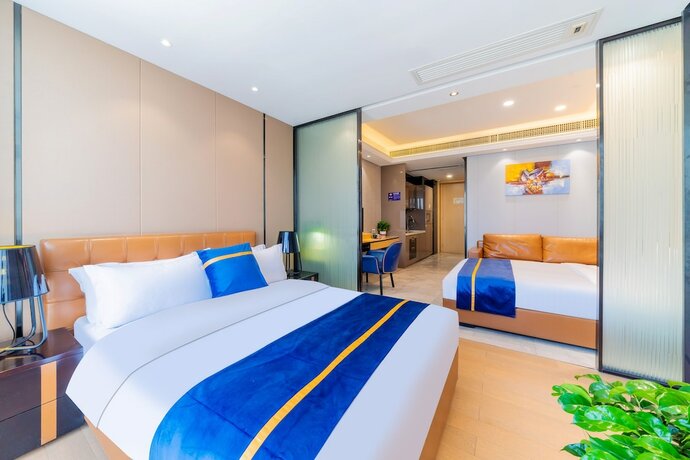 Imagen de la habitación del Hotel Cloudy International Apartment. Foto 12