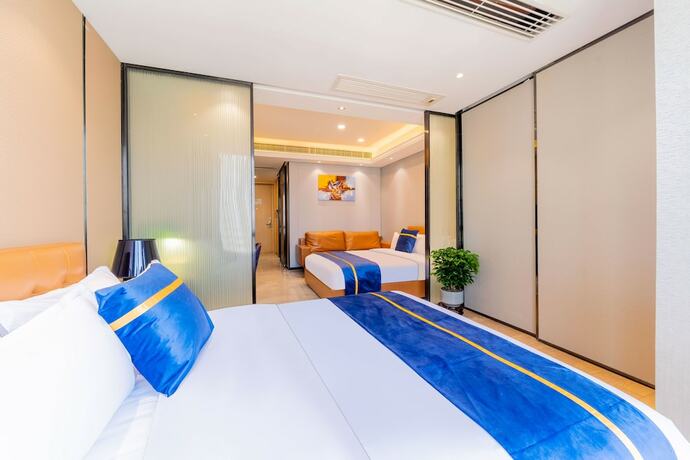 Imagen de la habitación del Hotel Cloudy International Apartment. Foto 17