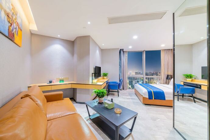 Imagen de la habitación del Hotel Cloudy International Apartment. Foto 18