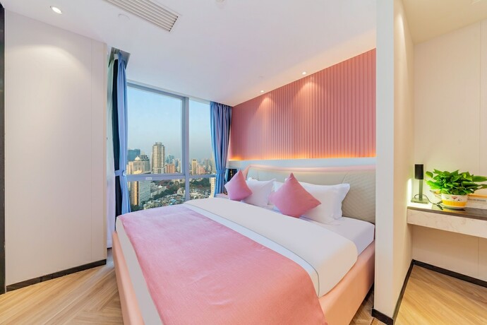 Imagen de la habitación del Hotel Cloudy International Apartment. Foto 21