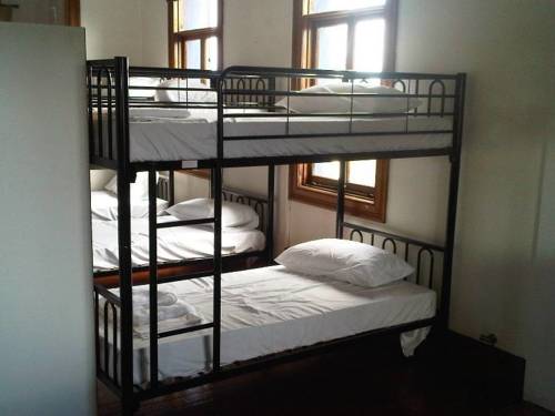 Imagen de la habitación del Hotel Clover Backpackers. Foto 2