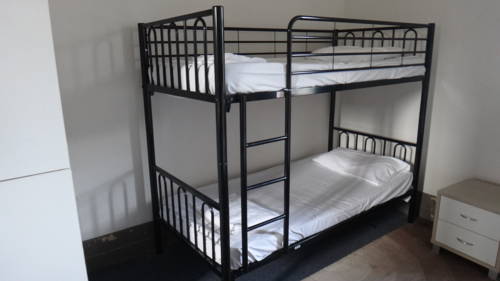 Imagen de la habitación del Hotel Clover Backpackers. Foto 3