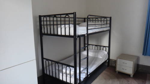 Imagen de la habitación del Hotel Clover Backpackers. Foto 4