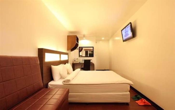 Imagen de la habitación del Hotel Clover City Center. Foto 3