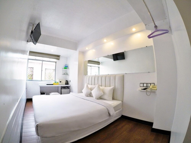 Imagen de la habitación del Hotel Clover City Center. Foto 15