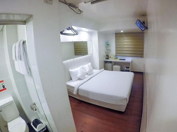 Imagen de la habitación del Hotel Clover City Center. Foto 16