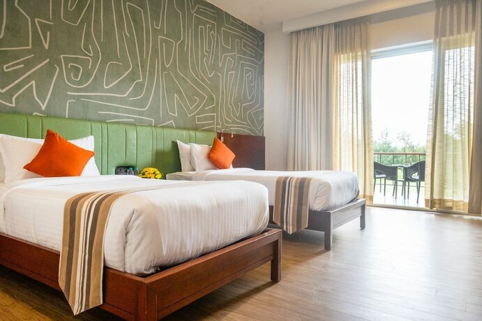 Imagen de la habitación del Hotel Clover Greens. Foto 16