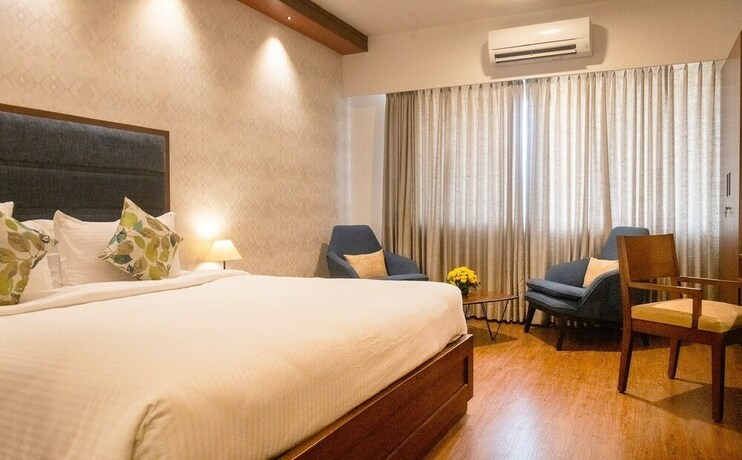 Imagen de la habitación del Hotel Clover Greens. Foto 18