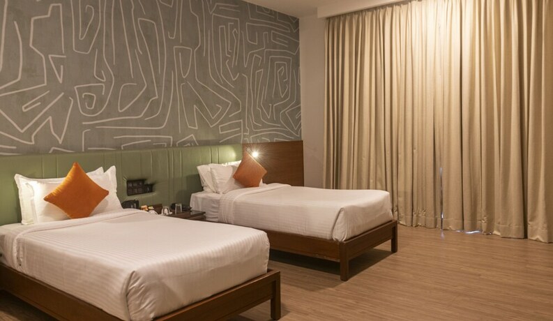 Imagen de la habitación del Hotel Clover Greens. Foto 19