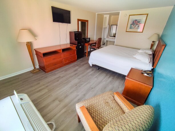 Imagen de la habitación del Hotel Clover Inn And Suites. Foto 17