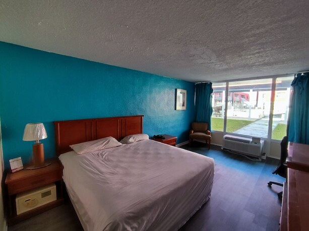 Imagen de la habitación del Hotel Clover Inn And Suites. Foto 18