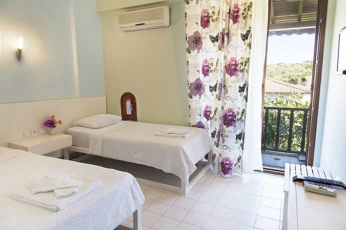 Imagen de la habitación del Hotel Club Antiphellos. Foto 8