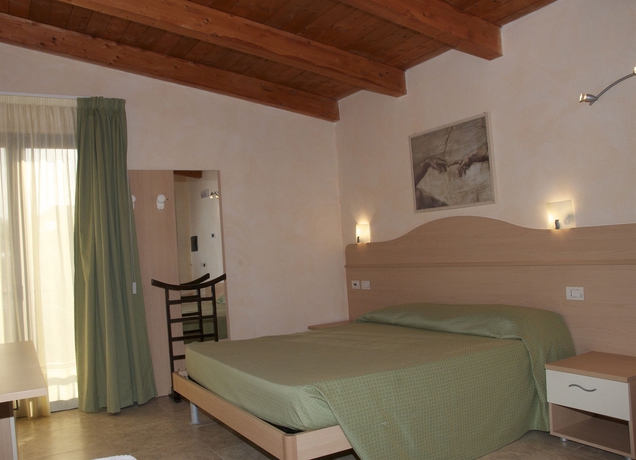Imagen de la habitación del Hotel Club - Baia Dei Gigli. Foto 3