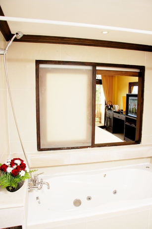 Imagen de la habitación del Hotel Club Bamboo Boutique Resort and Spa. Foto 9