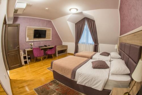 Imagen de la habitación del Hotel Club Bucovina. Foto 6