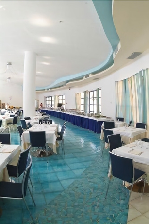 Imagen del bar/restaurante del Hotel Club Cala Longa. Foto 4