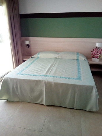 Imagen de la habitación del Hotel Club Esse Cala Bitta. Foto 14