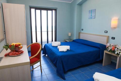 Imagen de la habitación del Hotel Club Esse Costa Dello Jonio. Foto 6