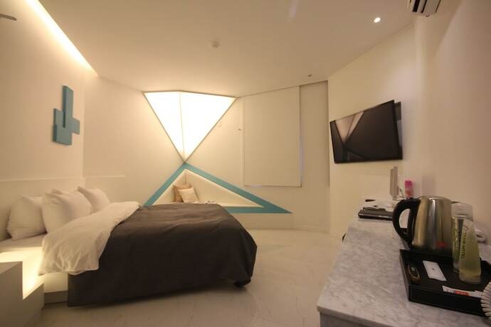 Imagen de la habitación del Hotel Club, Haeundae-gu. Foto 15