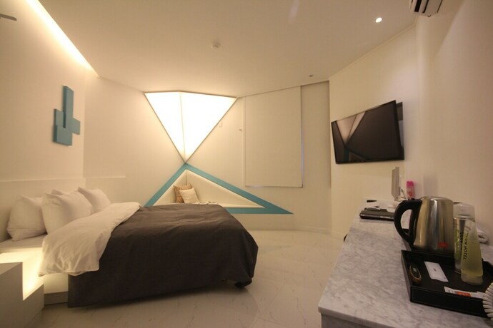 Imagen de la habitación del Hotel Club, Haeundae-gu. Foto 16