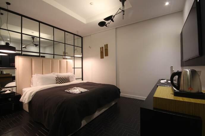 Imagen de la habitación del Hotel Club, Haeundae-gu. Foto 18