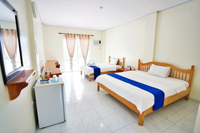 Imagen de la habitación del Hotel Club Hari Dive Resort. Foto 31