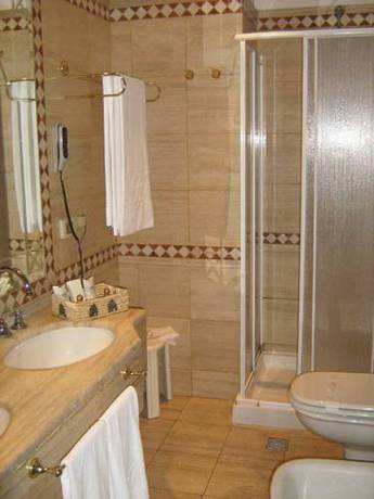 Imagen de la habitación del Hotel Club Il Baricentro. Foto 8