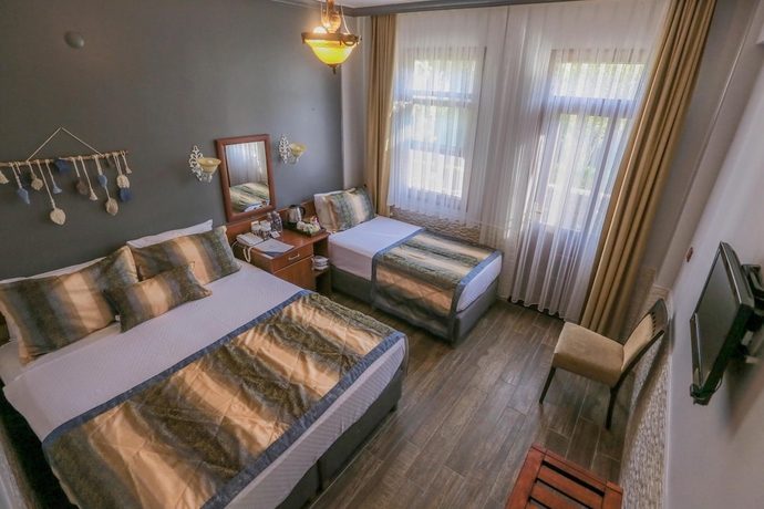 Imagen de la habitación del Hotel Club Kavala Beach Assos. Foto 7