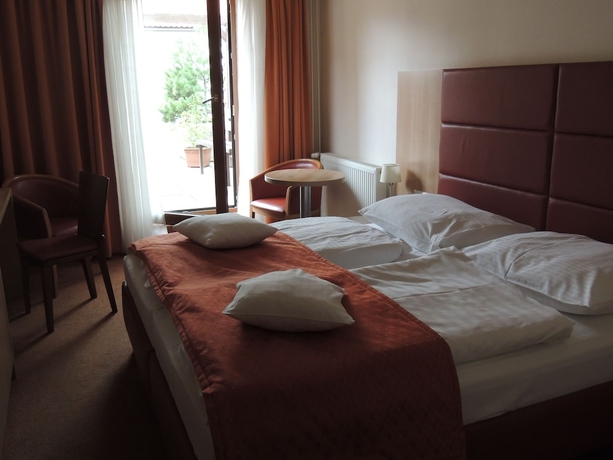 Imagen de la habitación del Hotel Club, Kezmarok. Foto 4