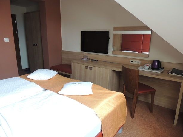 Imagen de la habitación del Hotel Club, Kezmarok. Foto 10