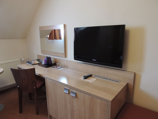 Imagen de la habitación del Hotel Club, Kezmarok. Foto 14