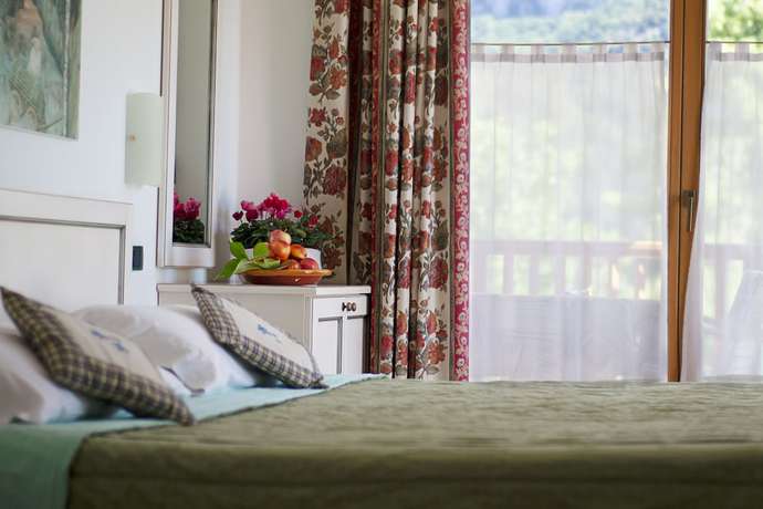 Imagen de la habitación del Hotel Club Lago di Tenno. Foto 5