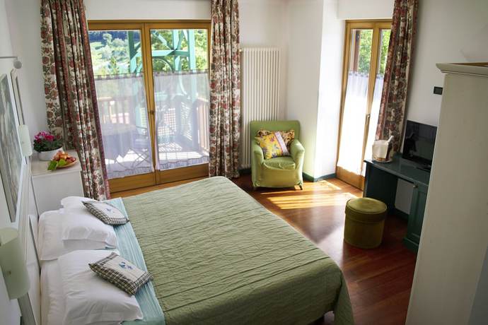Imagen de la habitación del Hotel Club Lago di Tenno. Foto 6