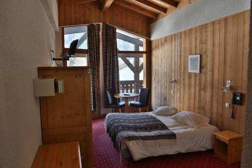 Imagen de la habitación del Hotel Club Le Crêt. Foto 2